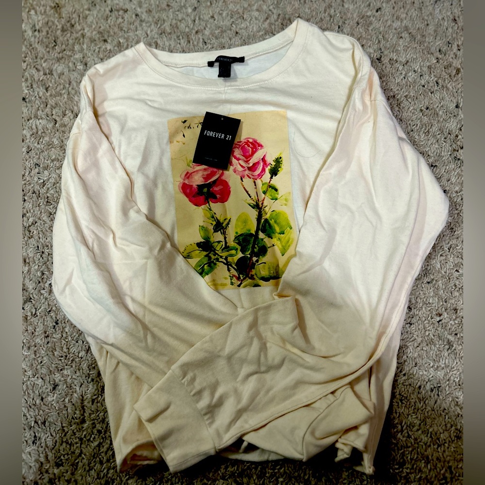 Cream colored cropped long sleeve shirt size (L)